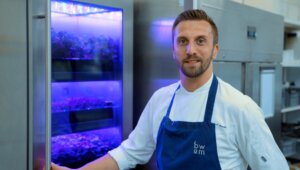 By Word of Mouth, Sous Chef Kieran in front of Evogro cabinet